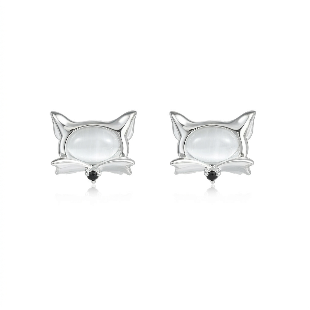Fox cat eye earrings on white background