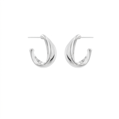 Simple twist metal earrings on white background
