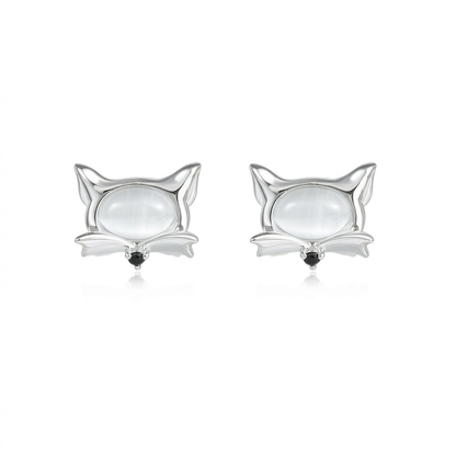 Fox cat eye earrings on white background