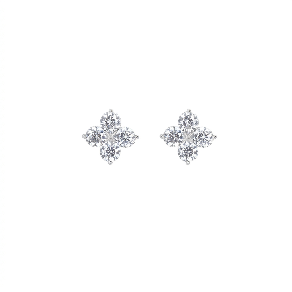 Four-leaf clover star zircon earrings on white background