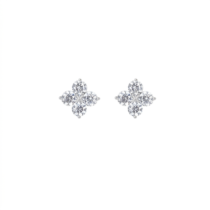 Four-leaf clover star zircon earrings on white background