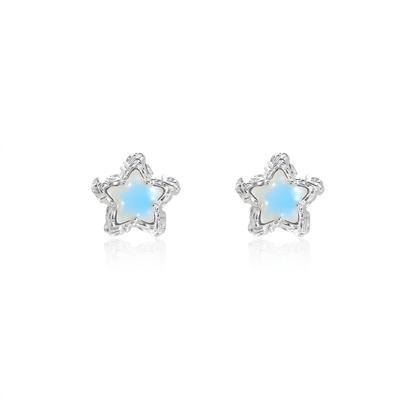 Blue star earrings on white background