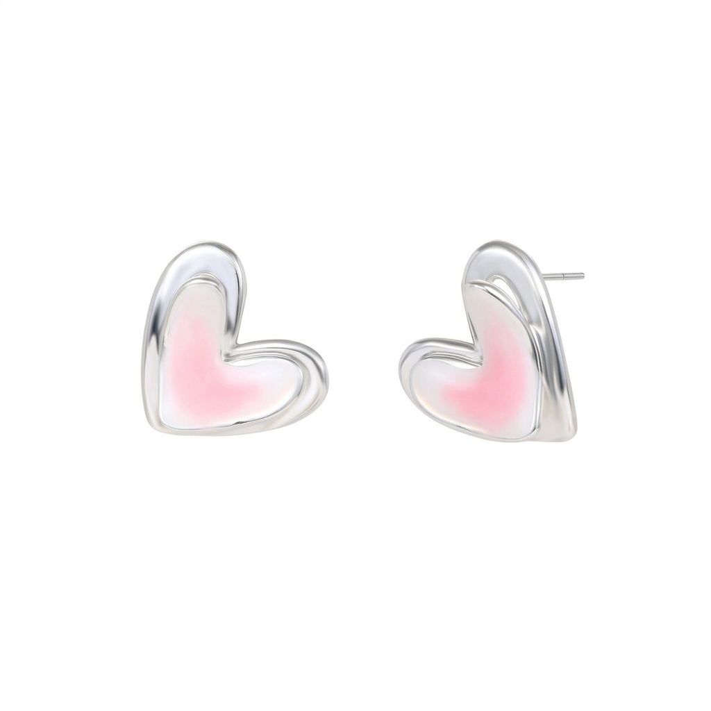 White flower earrings on white background