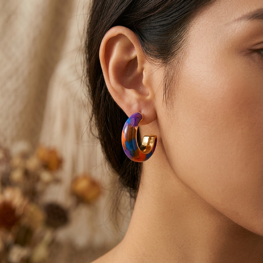 Brown dachshund dog earrings worn on model ear