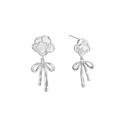 Colorful enamel C-shaped earrings on white background