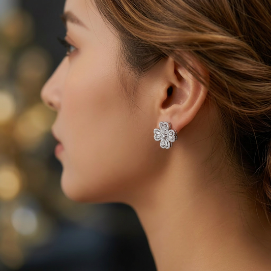 Camellia bow earrings worn on model ear
