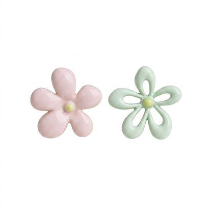 Korean color-clash flower earrings on white background